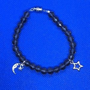 light purple beaded bracelet with moon and star charms (handmade)